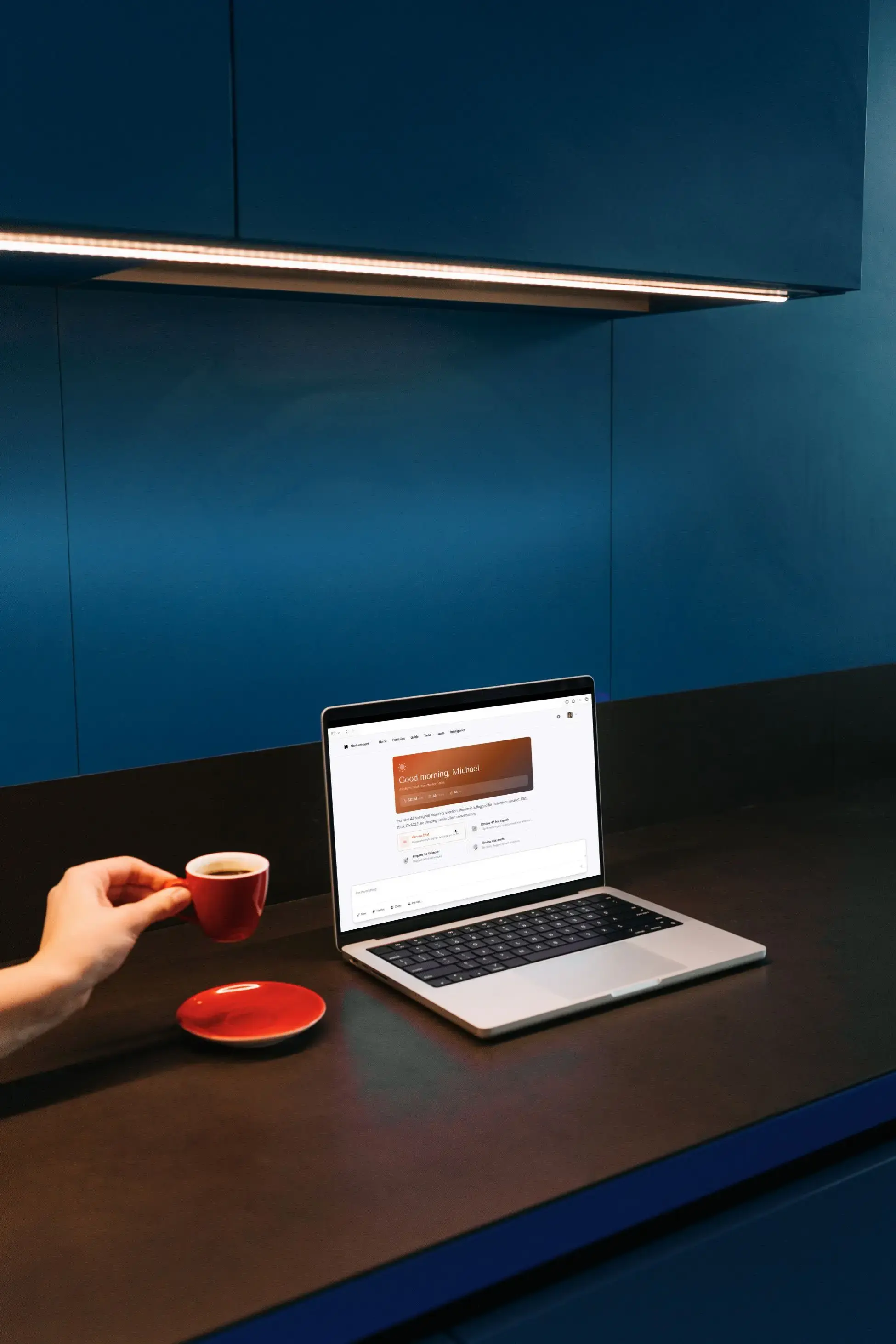 Laptop displaying Nextvestment platform in a modern office